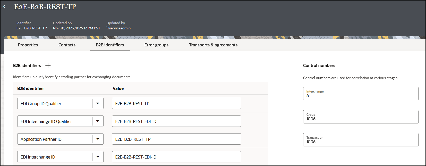 The Properties, Contacts, B2B identifiers (which is selected), and Transports & agreements tabs appear at the top. Below is the B2B Identifiers title and plus (add) icon, Below is a table with columns for B2B Identifier and Value. To the right is the Control numbers section, with fields for Interchange, Group, and Transaction. The Properties, Contacts, B2B identifiers (which is selected), and Transports & agreements tabs appear at the top. Below is the B2B Identifiers title and plus (add) icon, Below is a table with columns for B2B Identifier and Value. To the right is the Control numbers section, with fields for Interchange, Group, and Transaction.