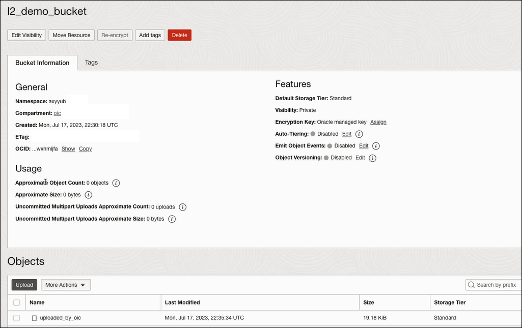 The details page for the bucket is shown. Tabs are shown for Edit Visibility, Move Resource, Re-encrypt, Add tags, and Delete. The Bucket Information subtag is selected. The General section includes the Namespace, Compartment, Created, ETag, and OCID fields. The Usage section shows fields for Approximate Object Count, Approximate Size, Uncommitted Multipart Uploads Approximate Count, and Uncommitted Multipart Uploads Approximate Size. The Features section shows fields for Default Storage Tier, Visibility, Encryption Key, Auto Tiering, Emit Object Events, and Object Versioning. At the bottom is the Objects section. The Upload tab is selected. A table with columns for Name, Last Modified, Size, and Storage Tier is shown. The details page for the bucket is shown. Tabs are shown for Edit Visibility, Move Resource, Re-encrypt, Add tags, and Delete. The Bucket Information subtag is selected. The General section includes the Namespace, Compartment, Created, ETag, and OCID fields. The Usage section shows fields for Approximate Object Count, Approximate Size, Uncommitted Multipart Uploads Approximate Count, and Uncommitted Multipart Uploads Approximate Size. The Features section shows fields for Default Storage Tier, Visibility, Encryption Key, Auto Tiering, Emit Object Events, and Object Versioning. At the bottom is the Objects section. The Upload tab is selected. A table with columns for Name, Last Modified, Size, and Storage Tier is shown.
