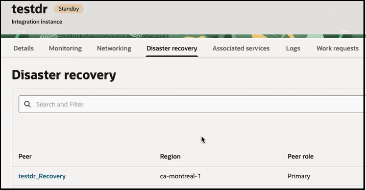 The instance name appears with the word Standby at the top. The Details, Monitoring, Networking, Disaster recovery (which is selected), Associated services, Logs, Work requests, and Tags tabs are shown. A Search field is shown. Below this is a table with columns for Peer, Region, and Peer role. The table shows that there is a testdr_Recovery instance in Montreal that is the primary instance. The instance name appears with the word Standby at the top. The Details, Monitoring, Networking, Disaster recovery (which is selected), Associated services, Logs, Work requests, and Tags tabs are shown. A Search field is shown. Below this is a table with columns for Peer, Region, and Peer role. The table shows that there is a testdr_Recovery instance in Montreal that is the primary instance.