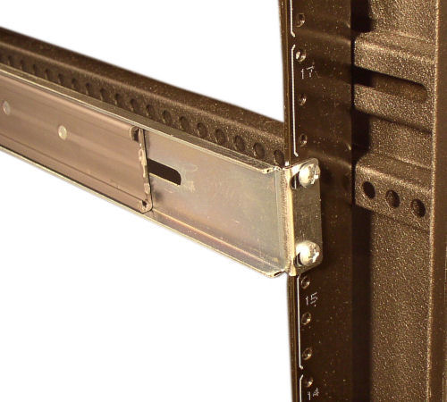 This picture shows the stationary slide rail properly secured to the rear mount point.