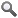 Magnifying glass with neither a plus nor minus sign.